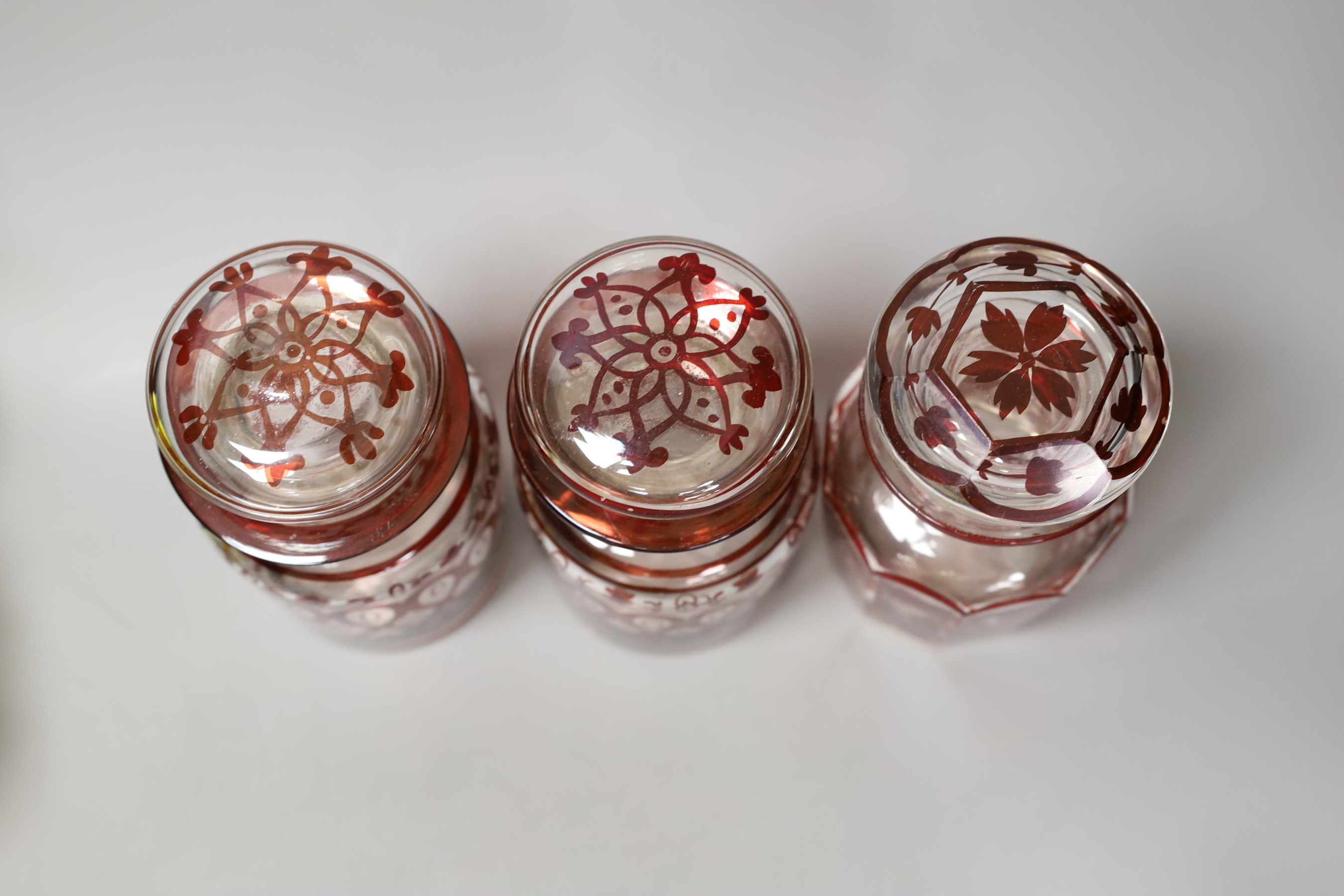 A pair of ruby flashed glass goblets, three ruby and glass pickle jars and other sundry glassware